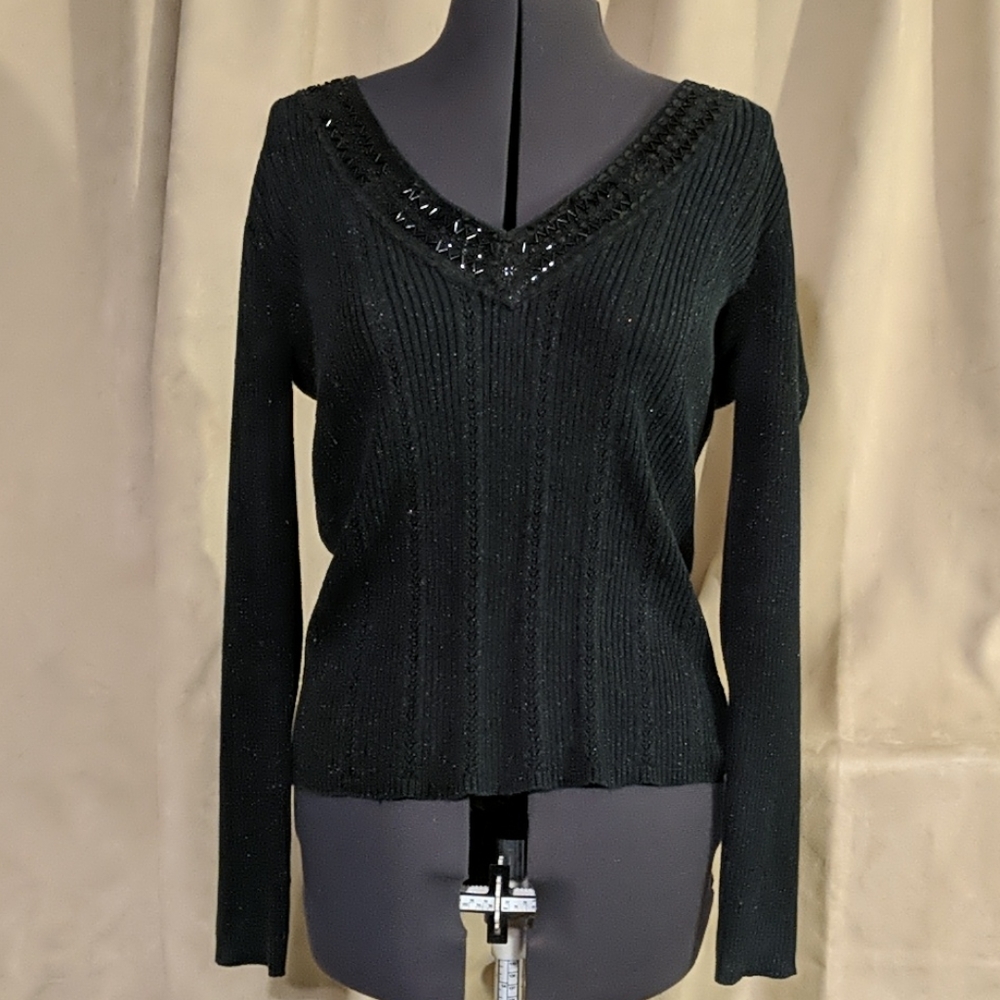 Black shimmery knit sweater with beaded neckline